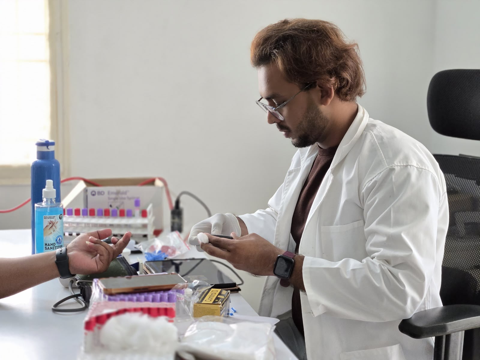 Lab technician at a YIRA health camp